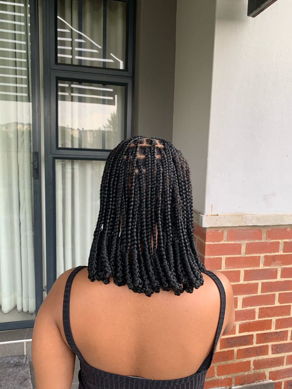 Weave installation at Touch of Beauty hair salon